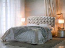 Качественная кровать. Место для отдыха и стильный предмет интерьера